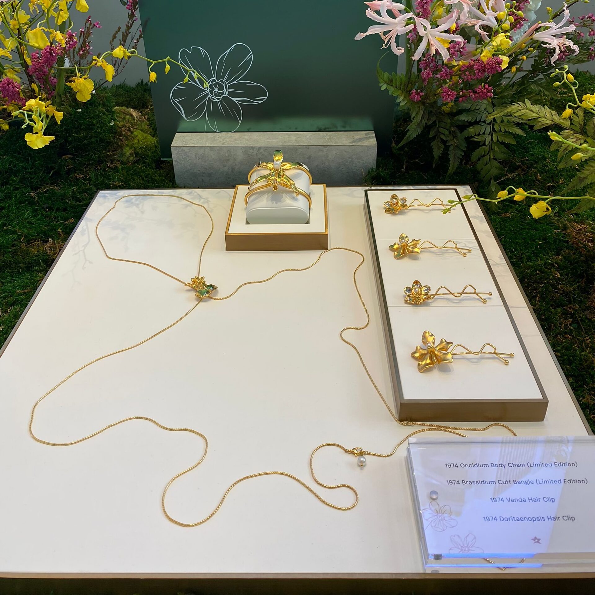 Natural Oncidium Panda Orchid encapsulated in 24K Swiss Gold with Freshwater Pearl