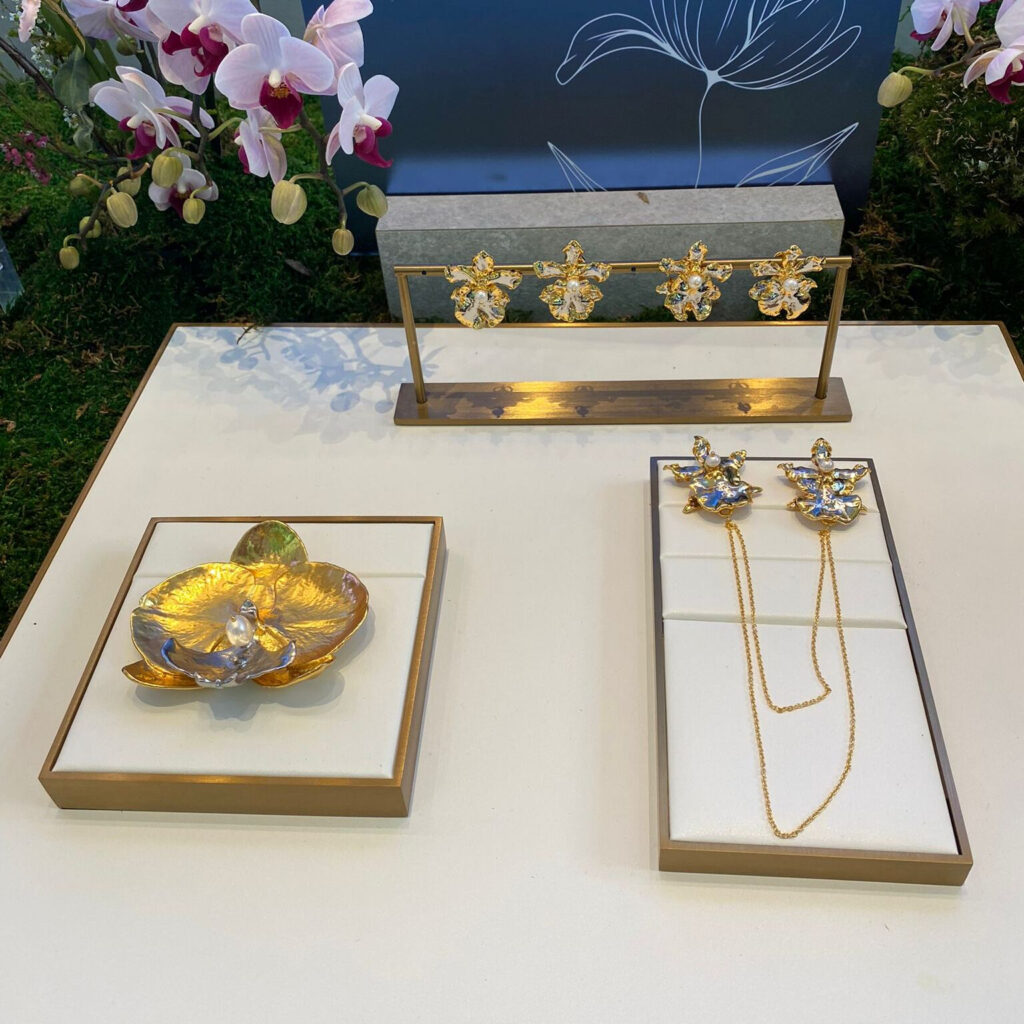 Natural Oncidium Brown Orchids encapsulated in 24K Swiss Gold and Palladium with Freshwater Pearls, Natural Phalaenopsis Big Lip Orchid encapsulated in 24K Swiss Gold and Palladium with Baroque Freshwater Pearl, Natural Oncidium Fragrance Orchid encapsulated in 24K Swiss Gold and Palladium with Freshwater Pearls